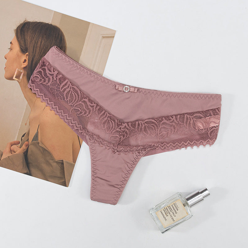 Thong Panty in Lace and Lycra, elastic waist, butterfly embellishment