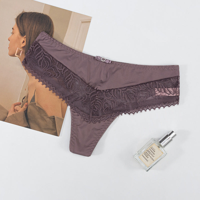 Thong Panty in Lace and Lycra, elastic waist, butterfly embellishment