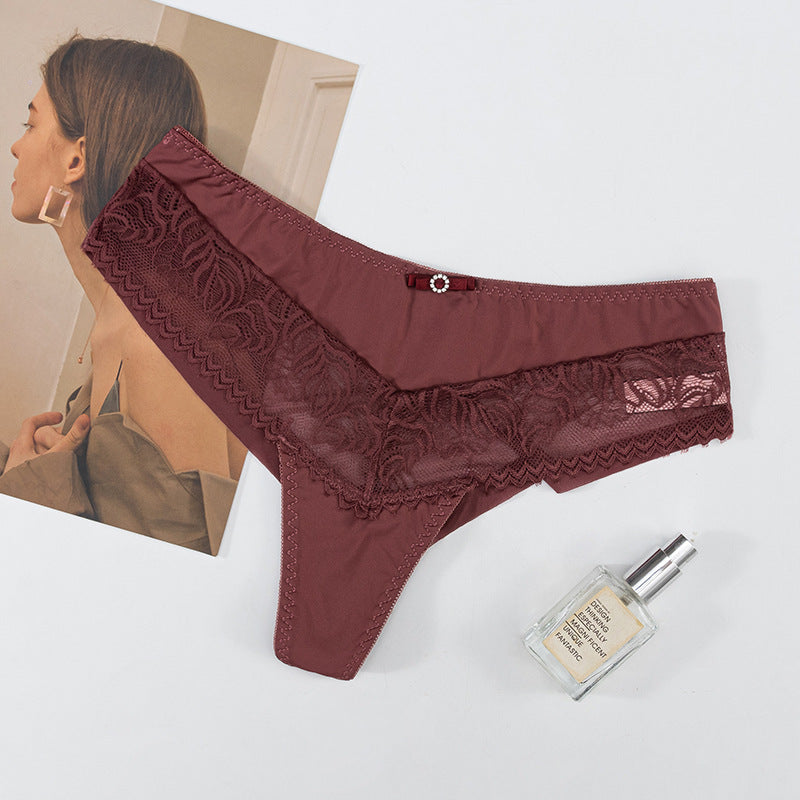 Thong Panty in Lace and Lycra, elastic waist, butterfly embellishment