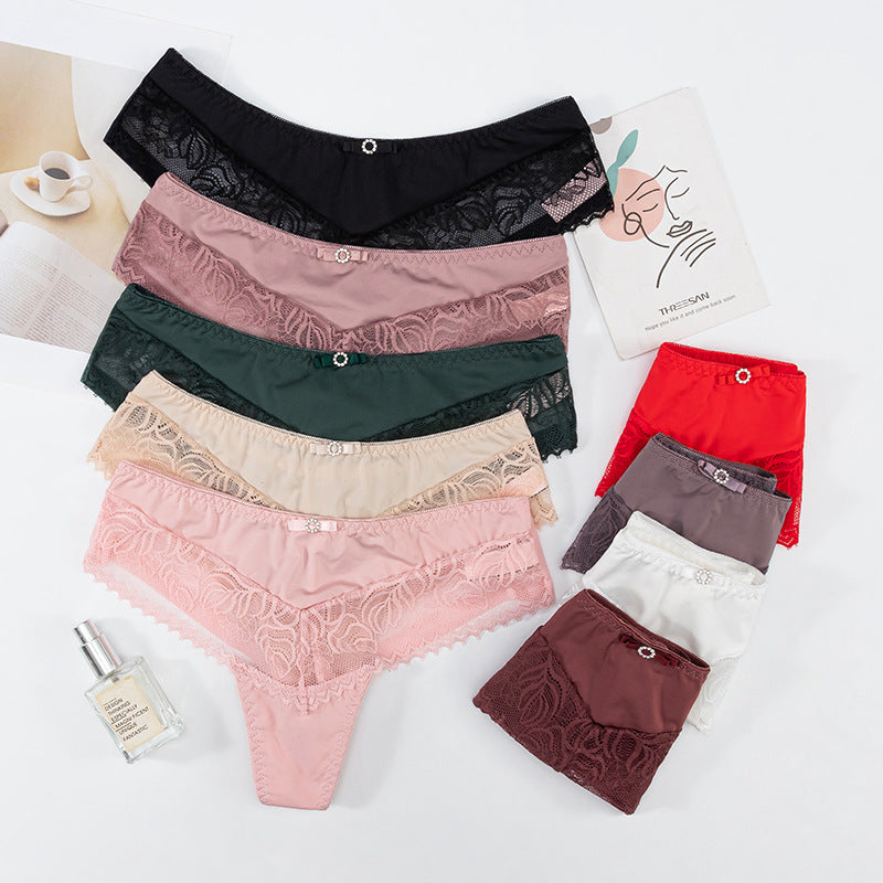 Thong Panty in Lace and Lycra, elastic waist, butterfly embellishment